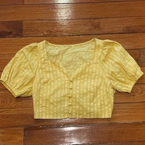 Cute yellow button up crop top with puffed sleeves